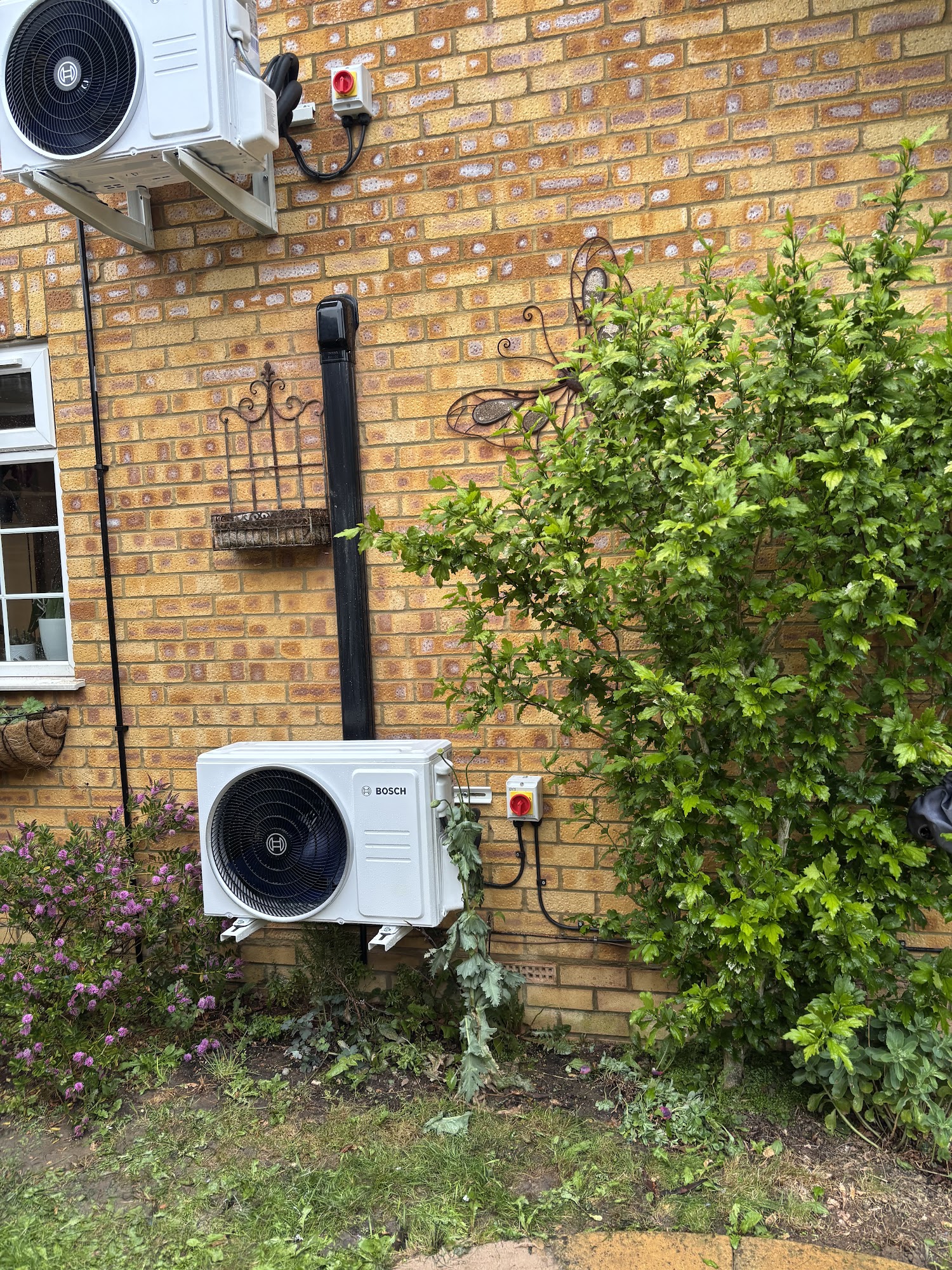 Outdoor air conditioning unit installed outside a home