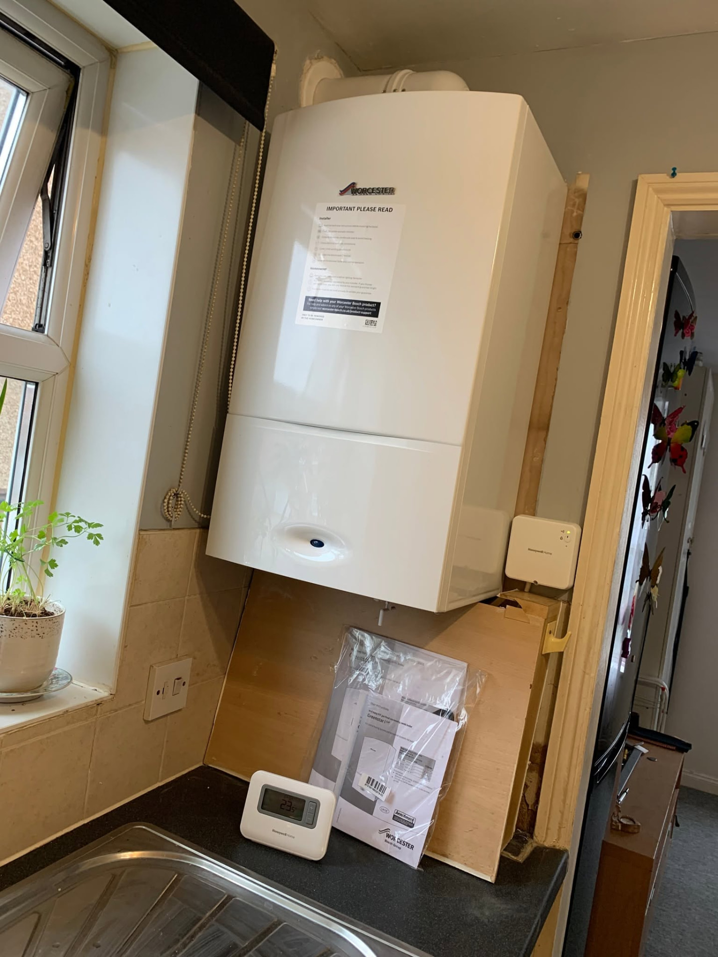 New Worcester boiler fitted on a kitchen wall
