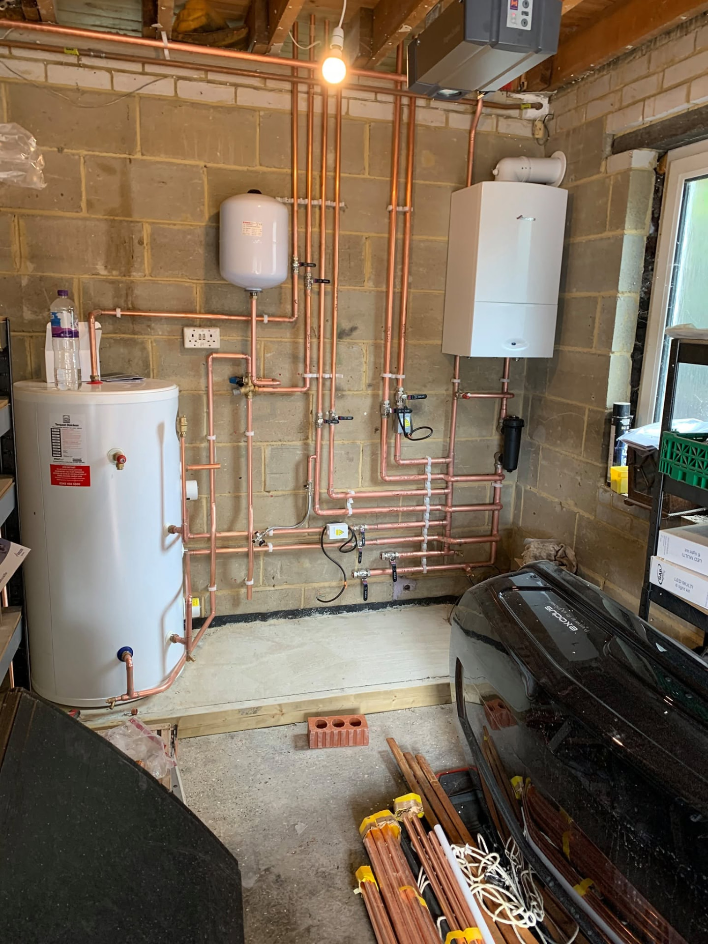System boiler installed alongside a hot water cylinder